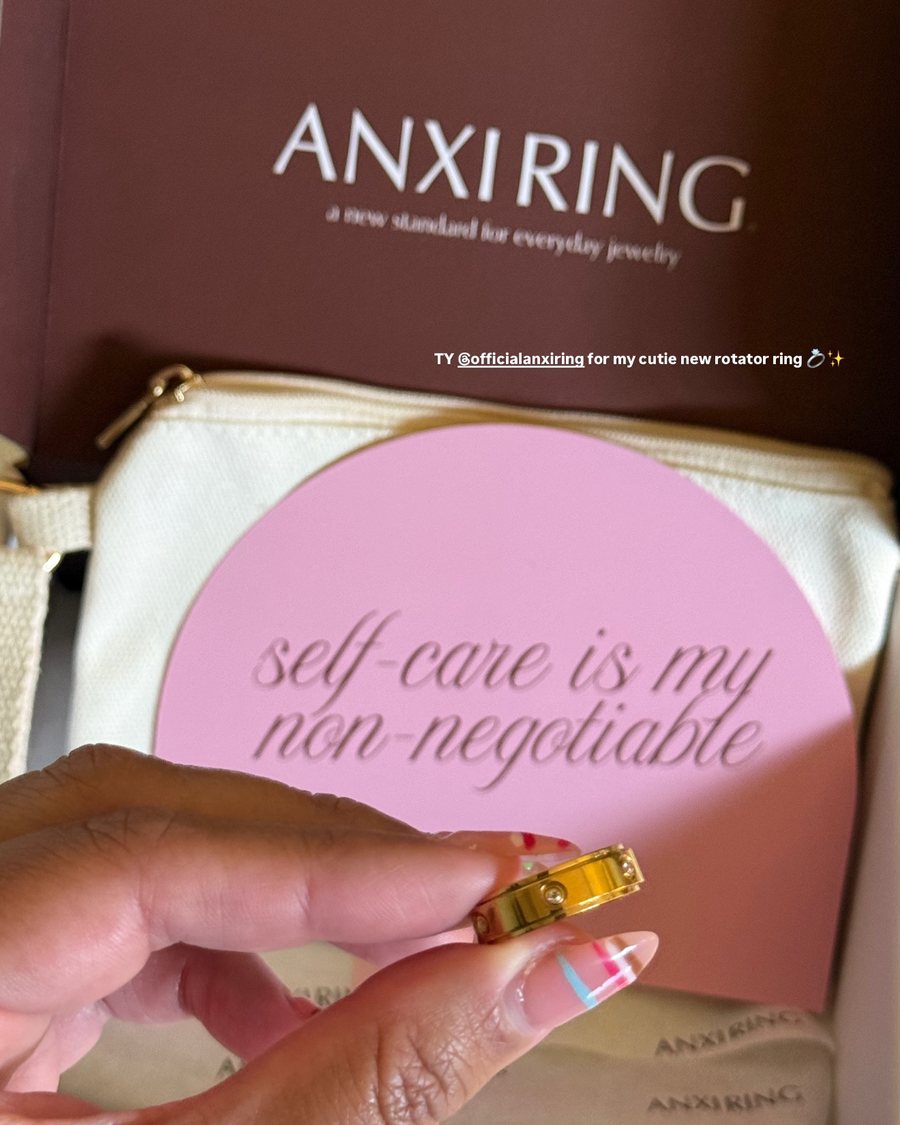 Anxi Ring pouch and self-care card, tagged @officialanxiring