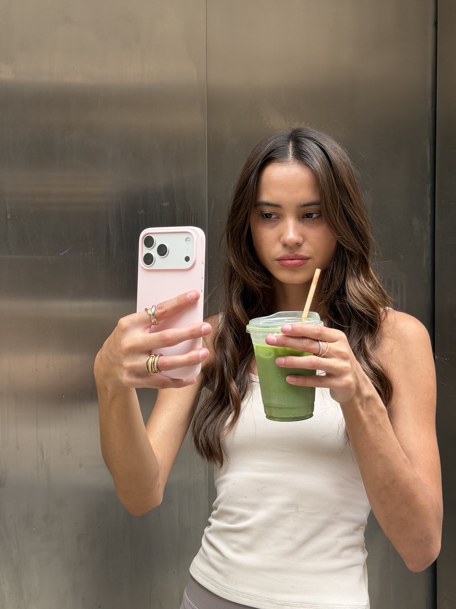Mirror selfie with a matcha, Anxi Rings on both hands